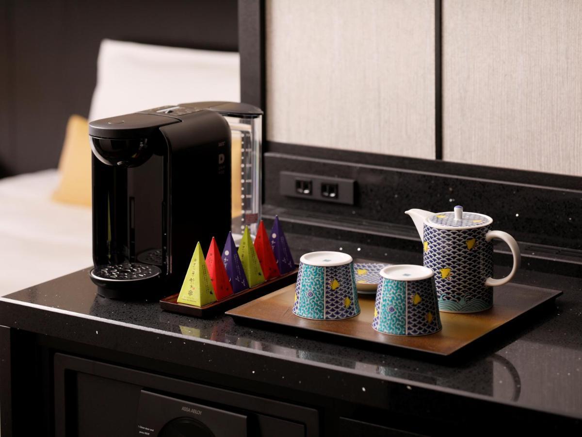 The Hotel Sanraku Kanazawa 21Th December 2022 Open Екстериор снимка A Nespresso coffee machine in a hotel room